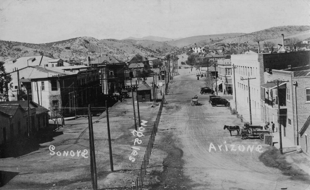 View of the border between Nogales, Arizona and Nogales, Sonora along International Street.
Arizona, Southwestern, and Borderlands Photograph Collection                                                                          (Courtesy of University of Arizona Libraries, Special Collections)